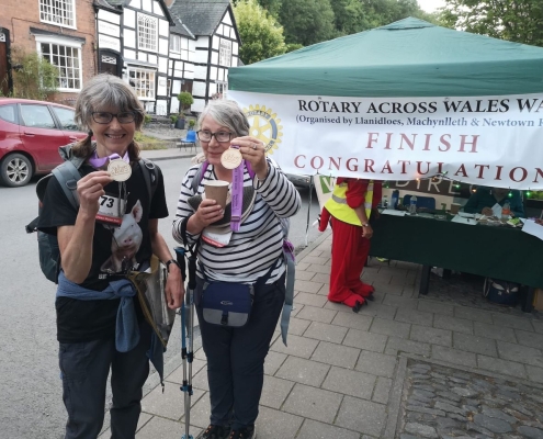 Cathy Beck from Beneath The Wood Sanctuary volunteer sponsored walk across Wales at the finish line