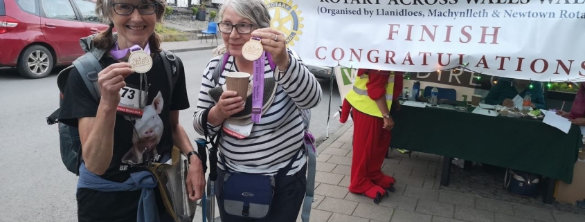 Cathy Beck from Beneath The Wood Sanctuary volunteer sponsored walk across Wales at the finish line